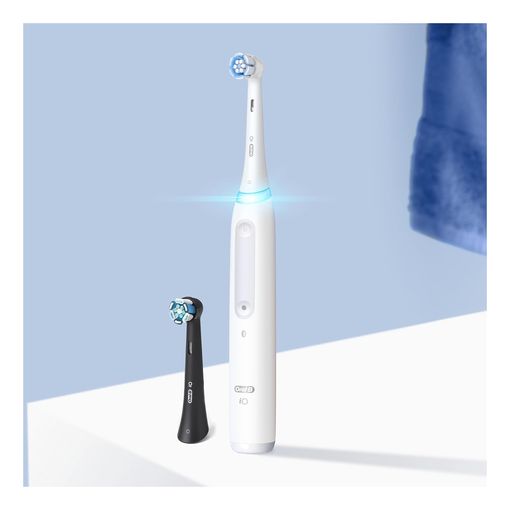 Oral-B iO Series 4 electric toothbrush with charging stand and travel case